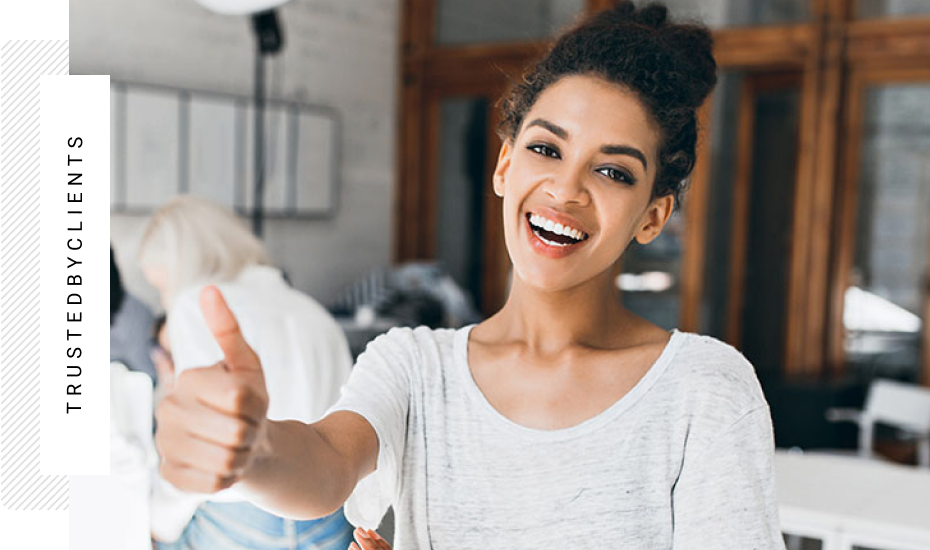Girl in the white T-shirt thumbs up her finger Girl in the white T-shirt thumbs up her finger